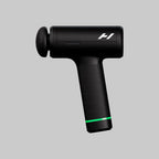 Hypervolt massage gun on plain white grey background.