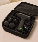 Hypervolt 3 with head attachments in its carry case