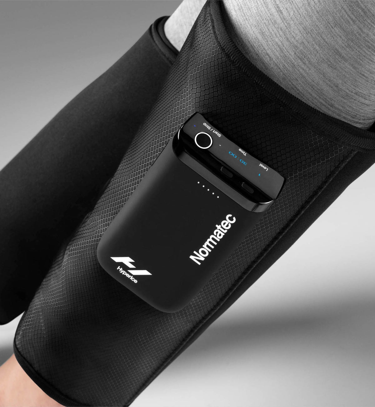 Close-up of the Normatec Lower Legs control on the calf