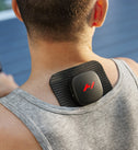 Person wearing a venom go pad and pod on the back of his neck with a blurred background
